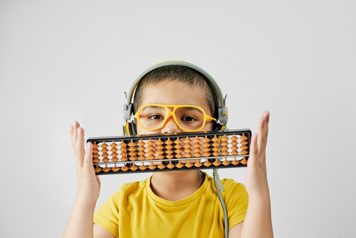 Schoolboy with Abacus. Young Kid Training Mental Arithmetic